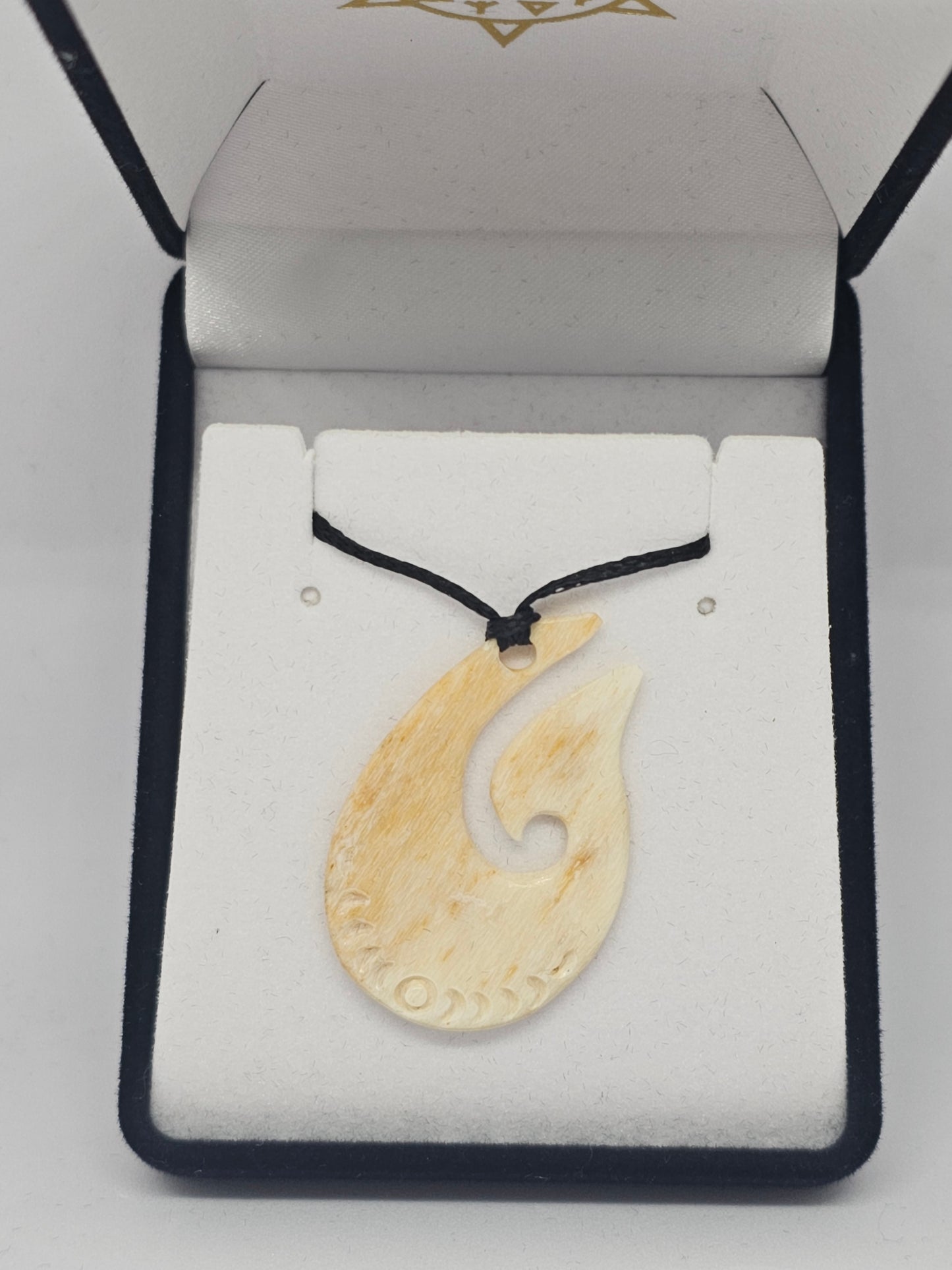 Whale bone - hei matau - Rivendell Shop
