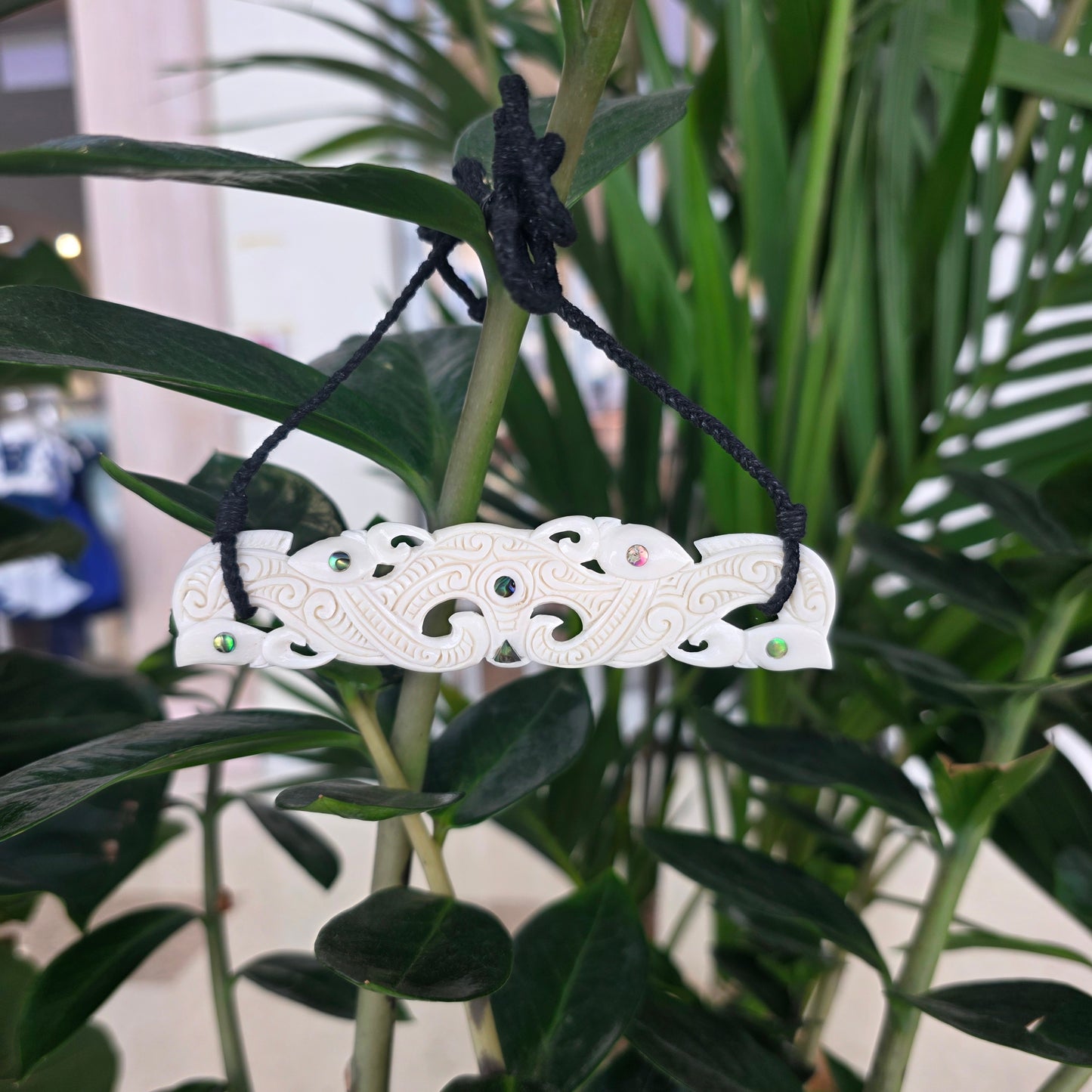 Handcarved Bone Chest Plate Pendant - Manaia