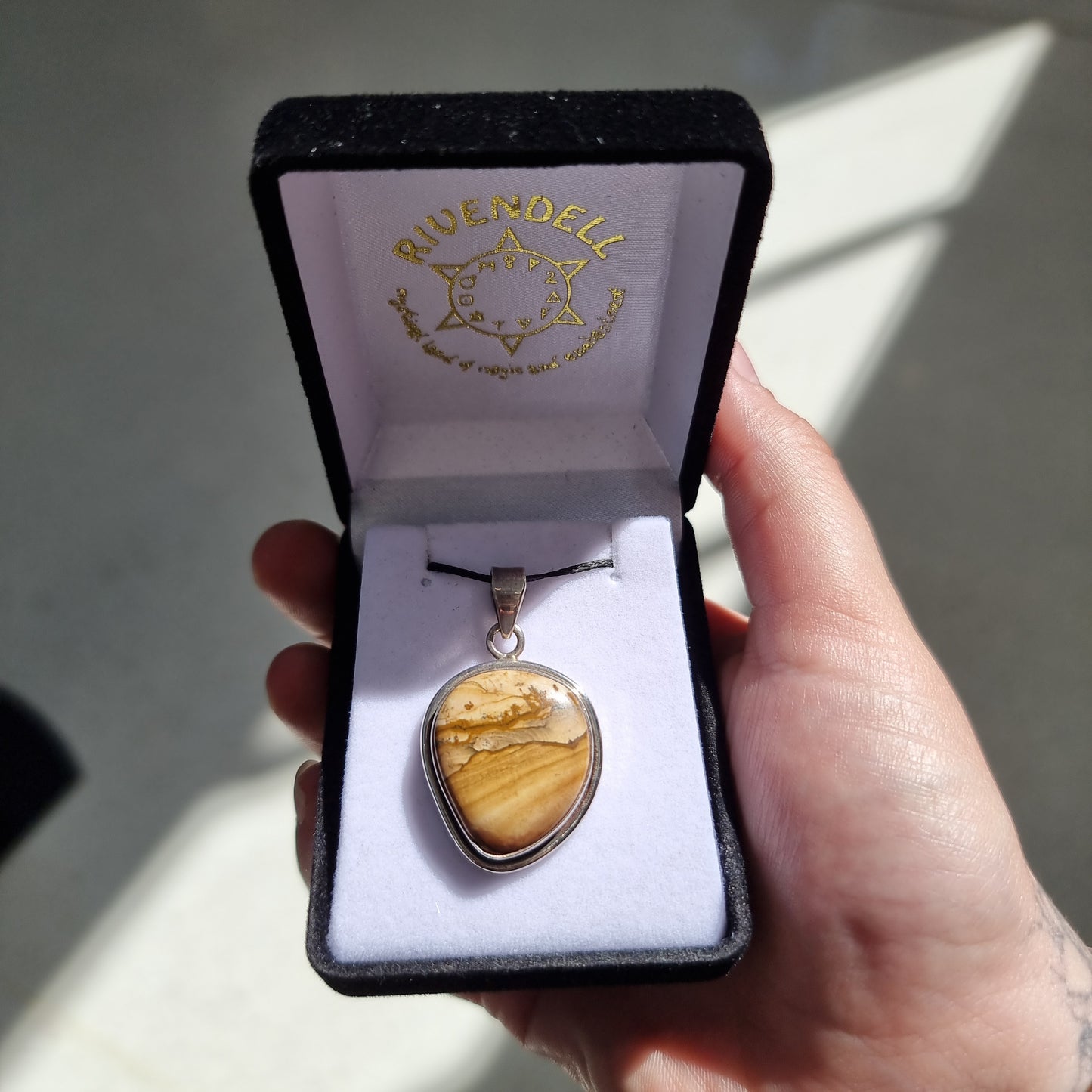 Petrified wood pendant - Rivendell Shop
