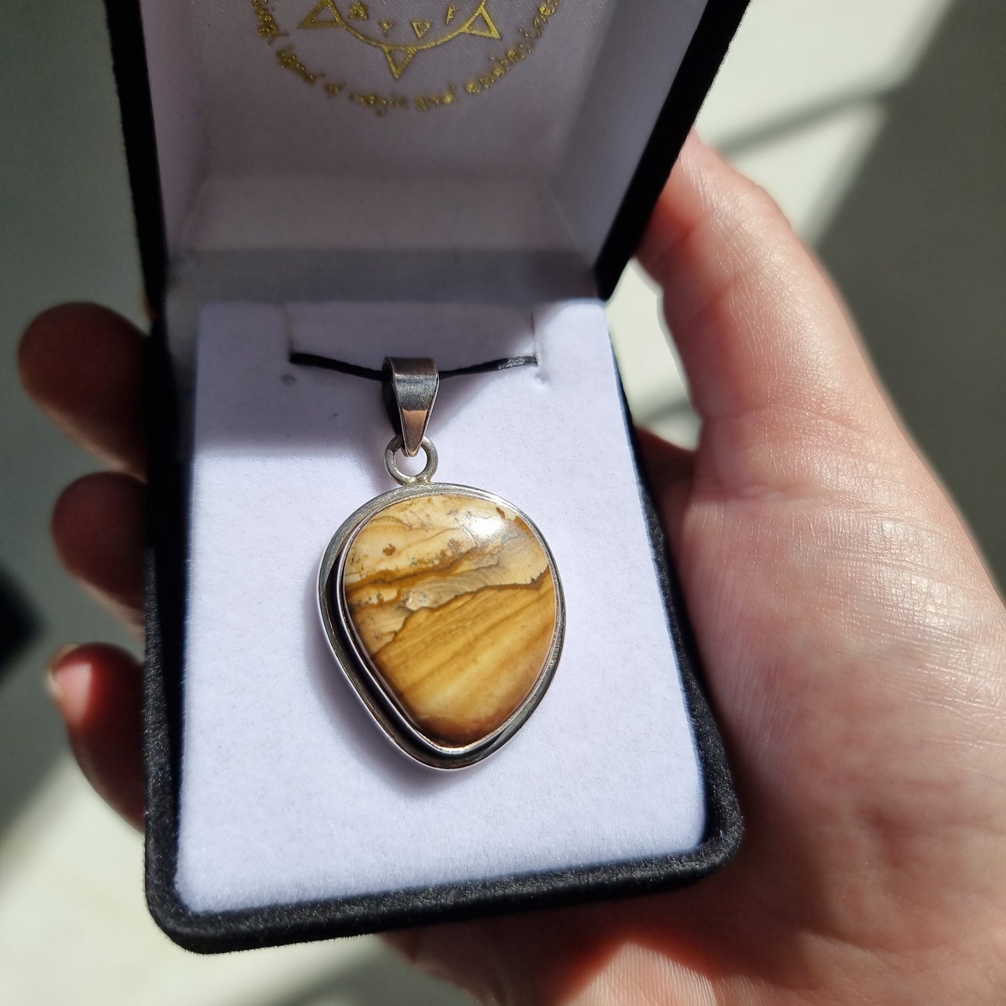 Petrified wood pendant - Rivendell Shop
