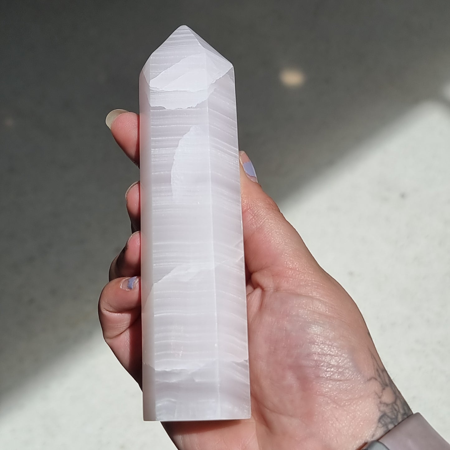 Mangano calcite point - Rivendell Shop