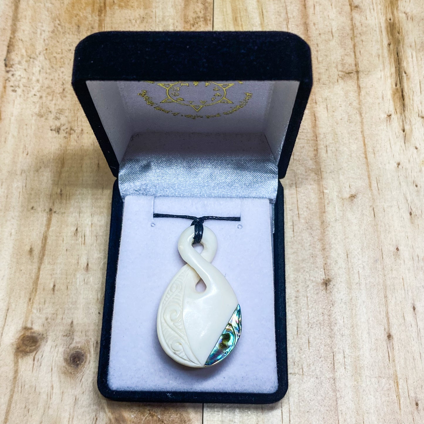 Handcarved Twist Bone Carving Pendant With Paua and Design - Pikorua - Rivendell Shop