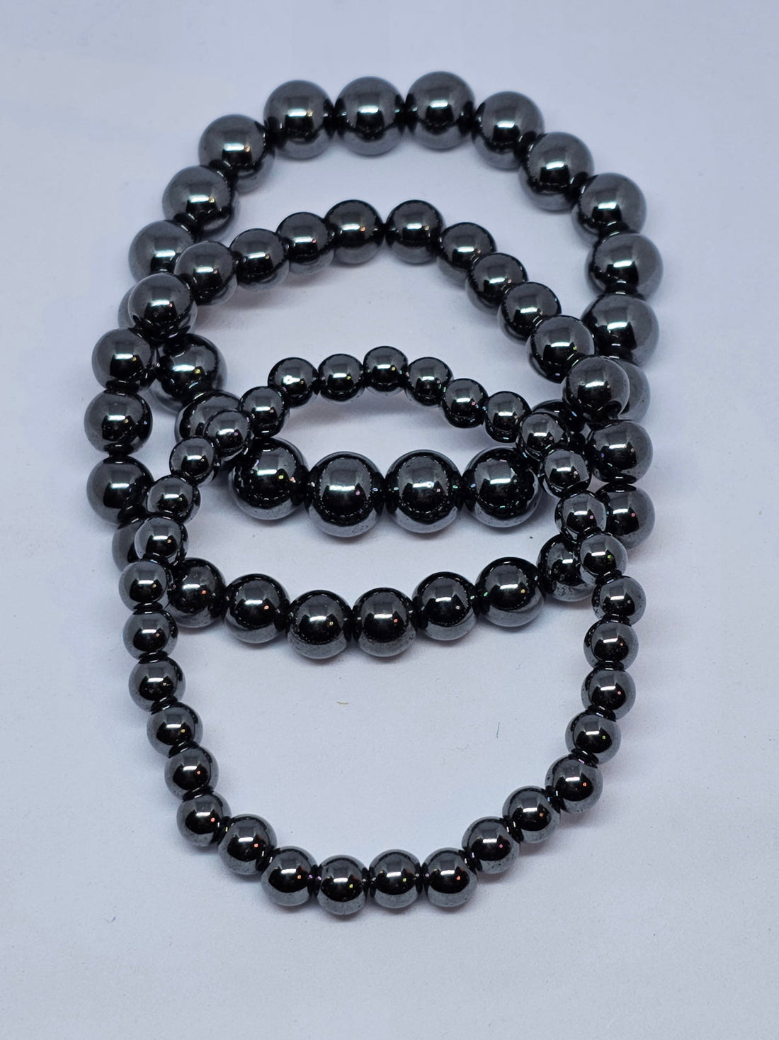 Polished hematite bead bracelet with a cool metallic silver-grey shine