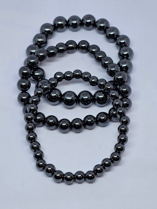 Polished hematite bead bracelet with a cool metallic silver-grey shine