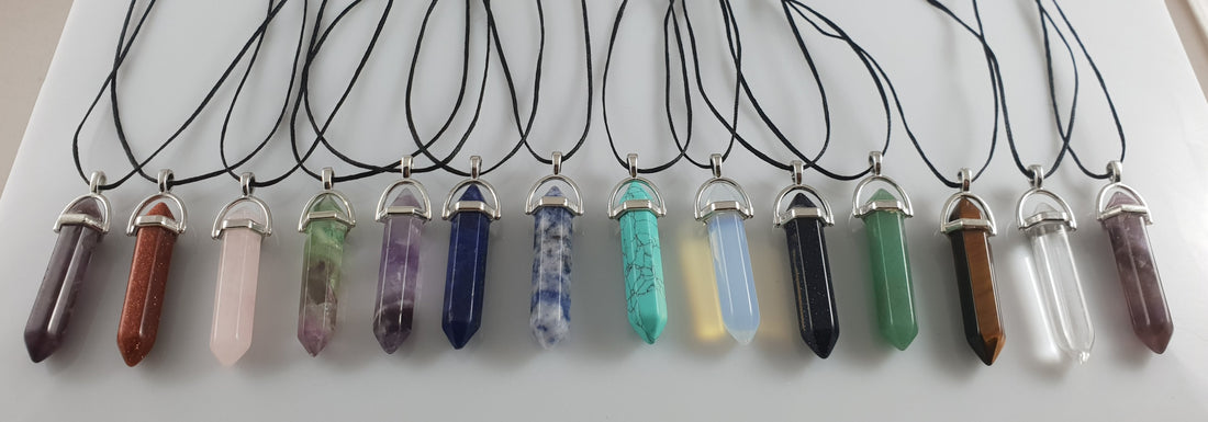 Rivendell crystal point pendants in varied colours