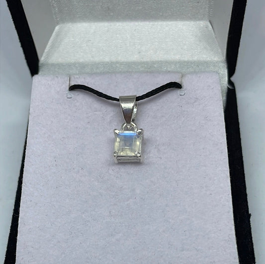 Oval moonstone pendant in an ornate sterling silver setting