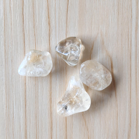 Tumbled citrine crystals in warm yellow and honey-orange tones