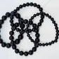 Black Onyx Round Bead Crystal Bracelet - Rivendell Shop