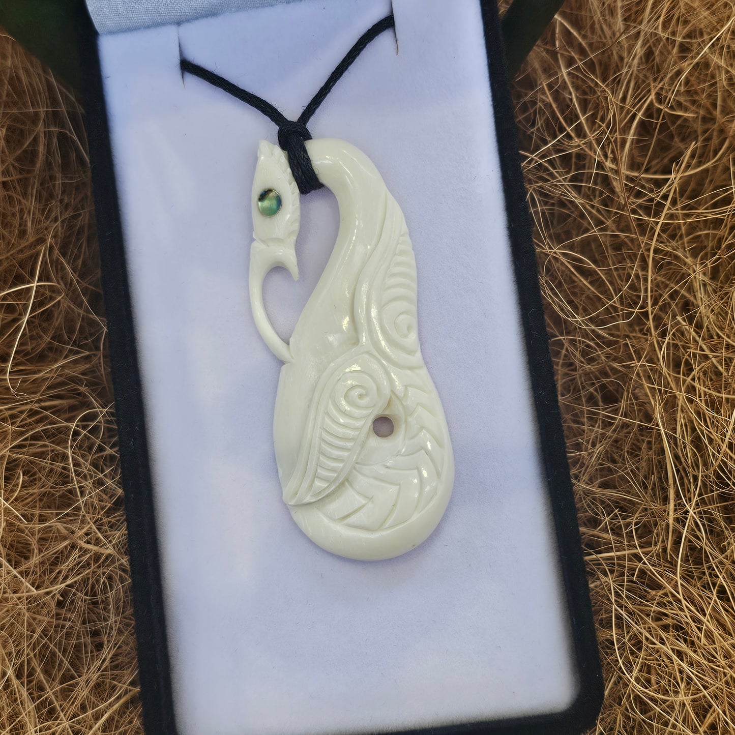 Manaia bone carving