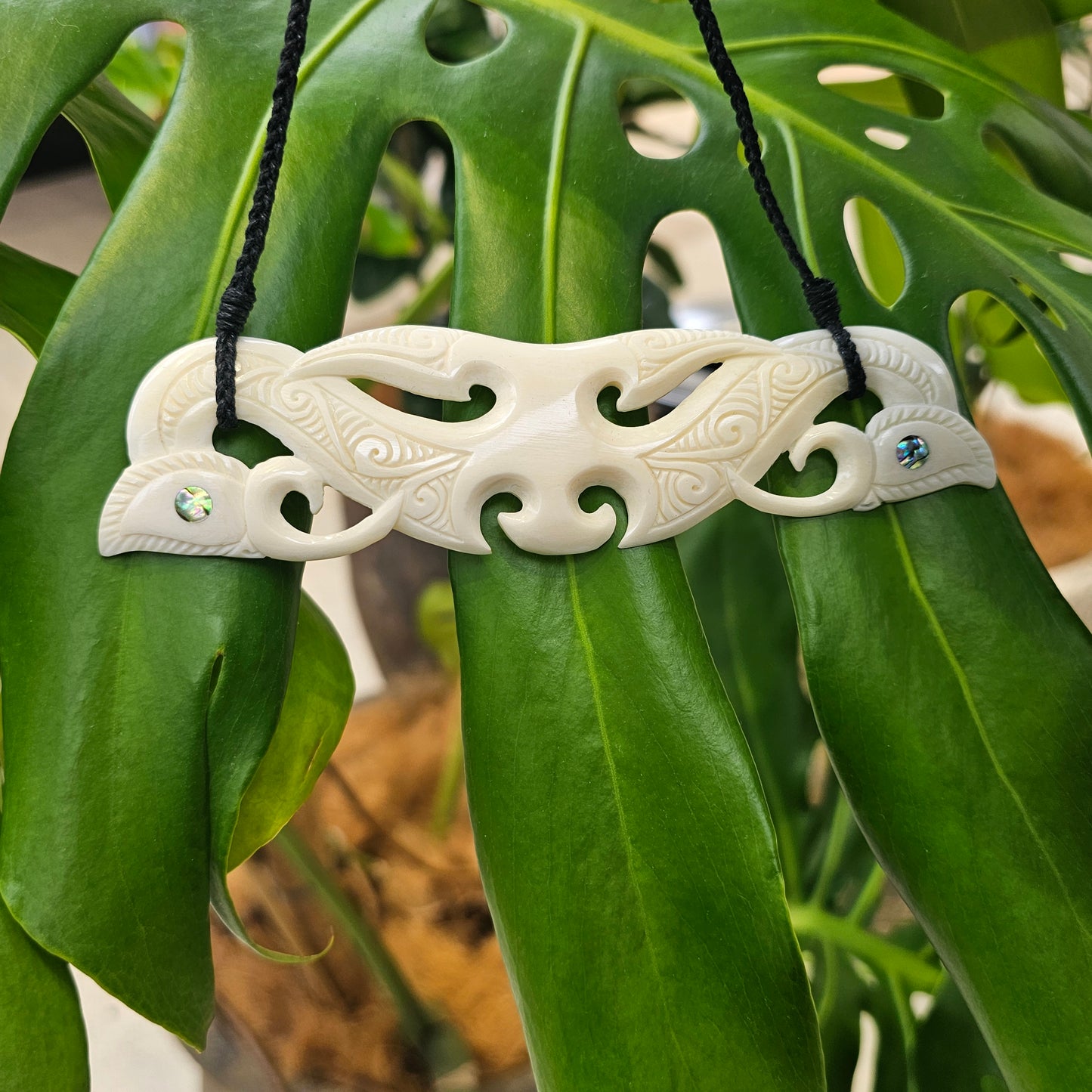 Double Manaia Bone Breastplate with Paua