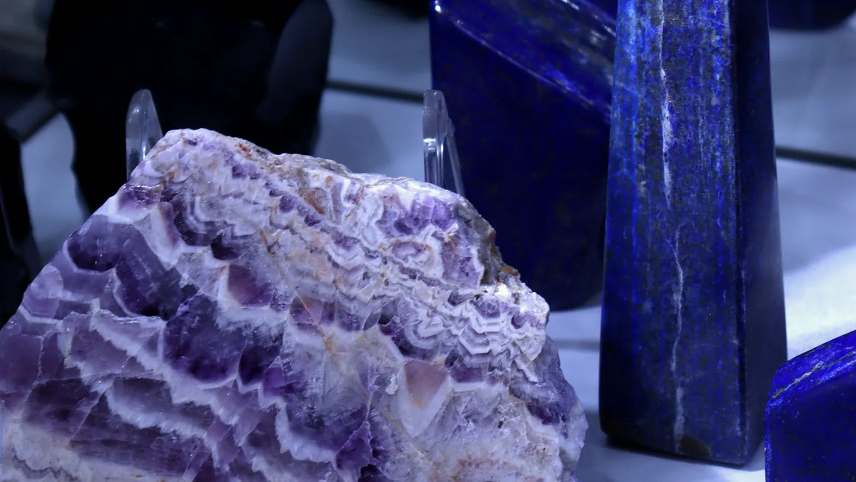 Lapis lazuli towers beside a chevron amethyst slab