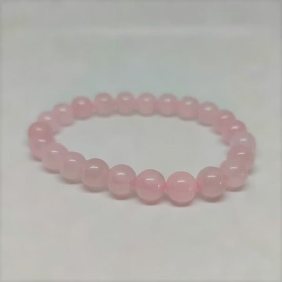 AI-processed: Rose Quartz Round Bead Crystal Bracelet