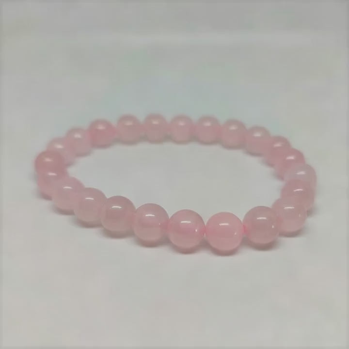 AI-processed: Rose Quartz Round Bead Crystal Bracelet