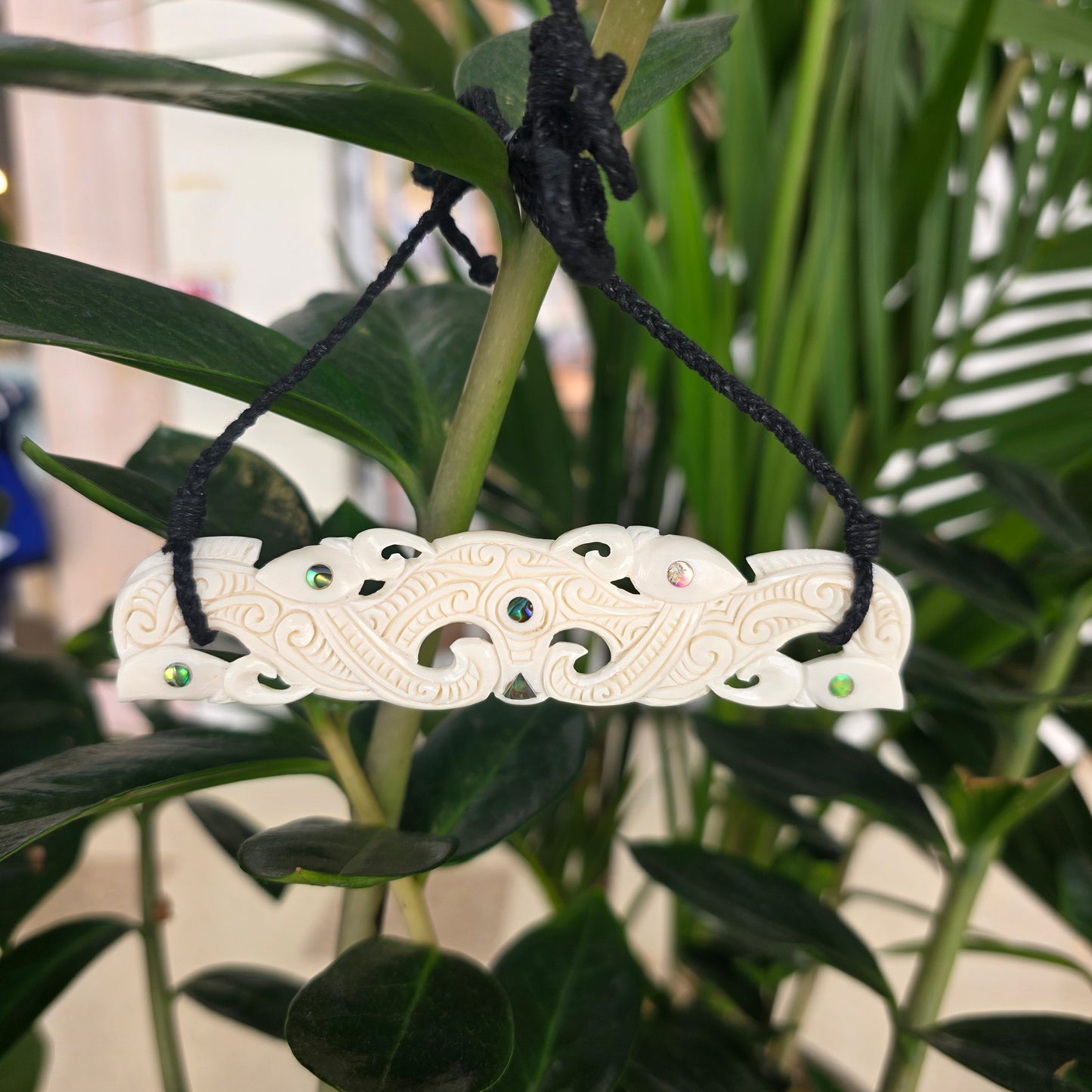 Handcarved Bone Chest Plate Pendant - Manaia
