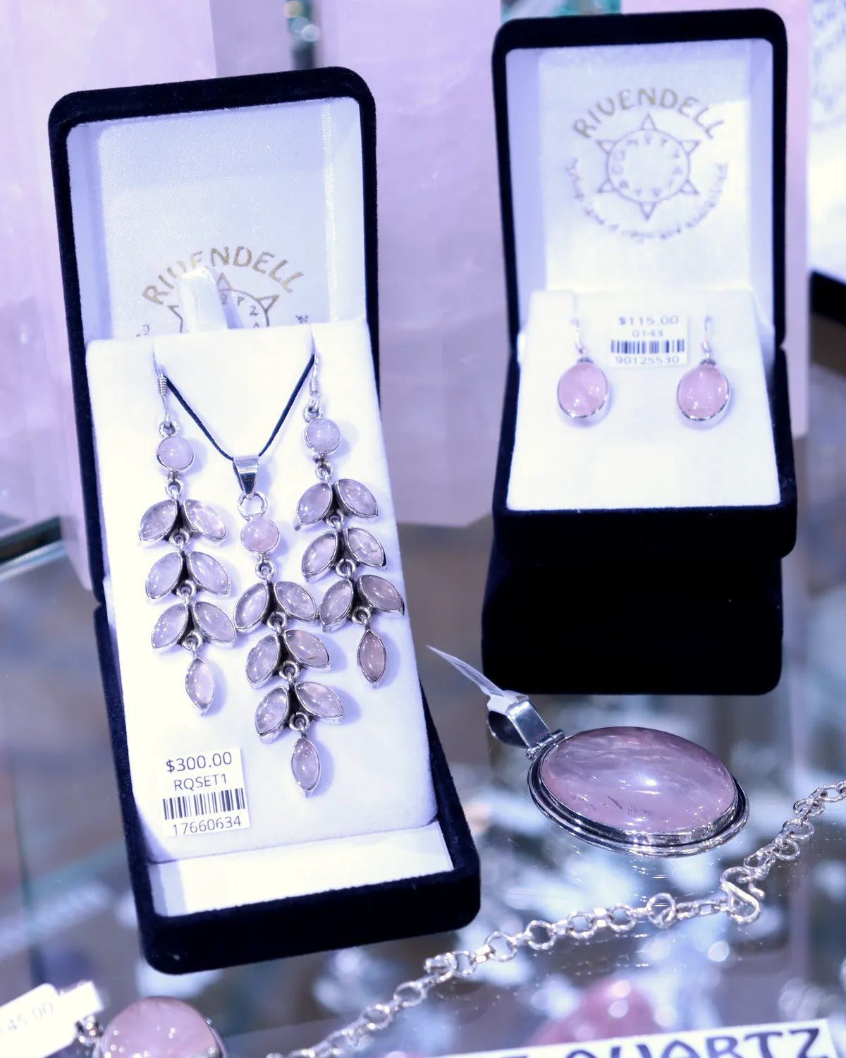 Rose quartz pendant and earrings set in its gift boxes in our shop