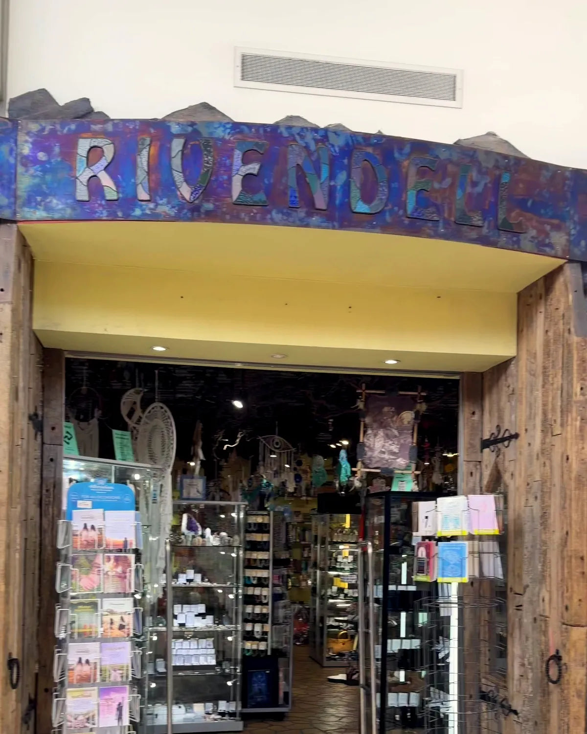 Rivendell's shop front in Westfield Manukau, with the Rivendell sign over the open doorway