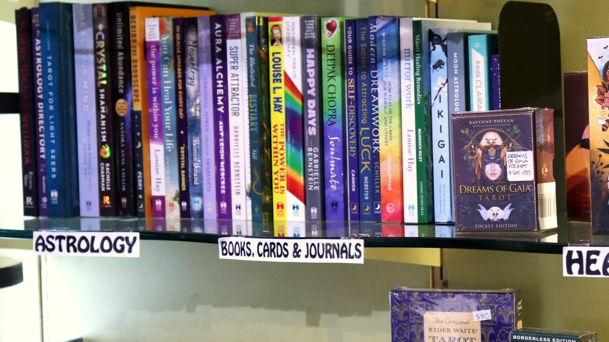 Tarot decks and spiritual books on shop shelves