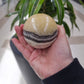 Zebra calcite sphere - Rivendell Shop