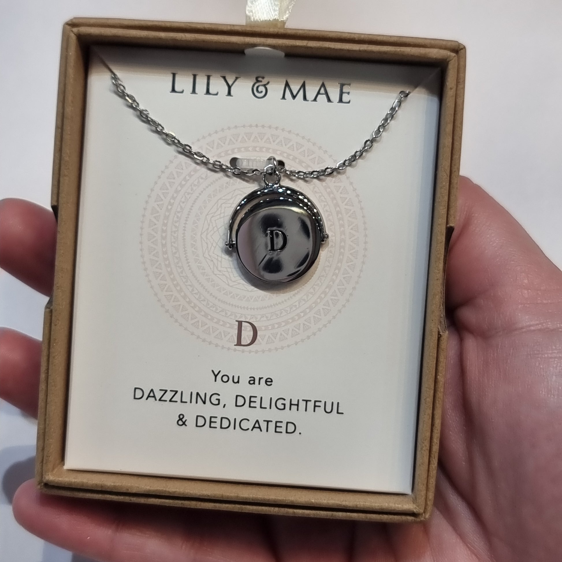 L&M spinning necklace - D - Rivendell Shop