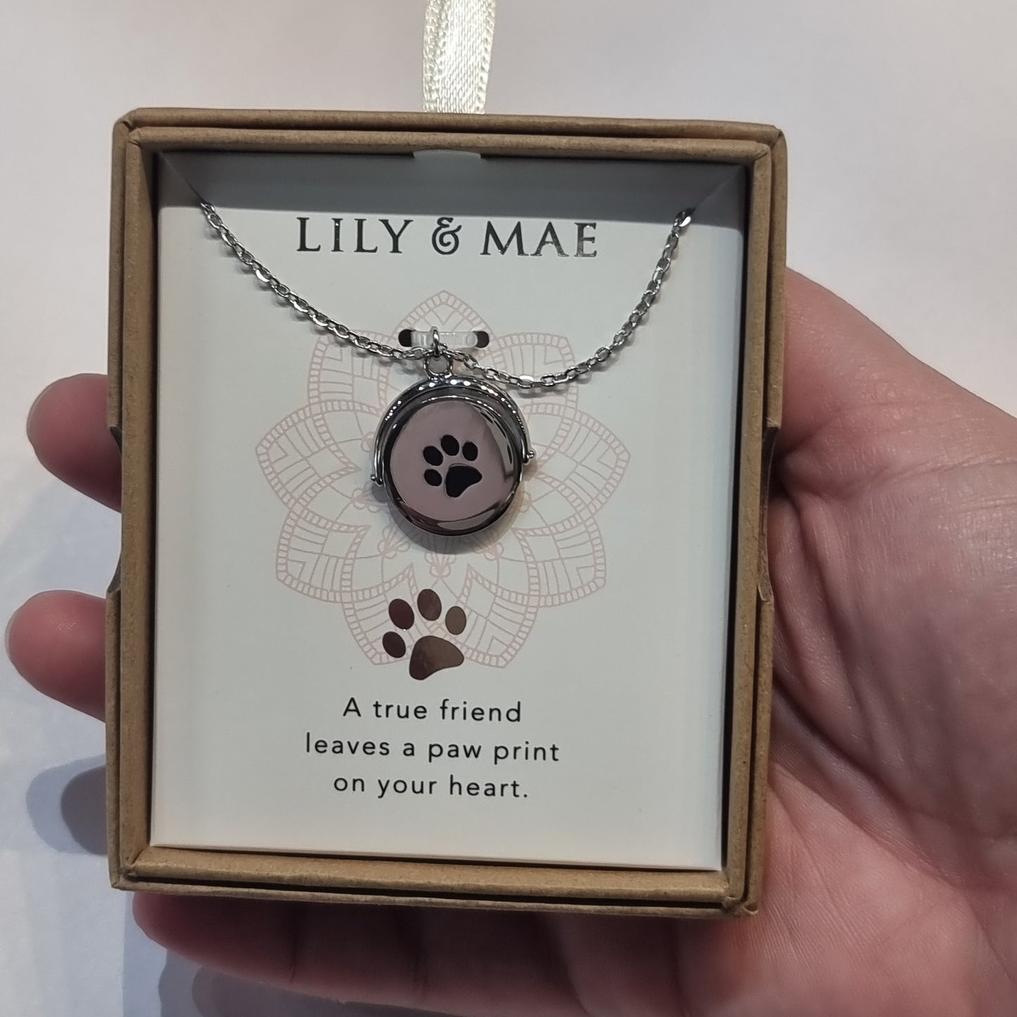 L&M spinning necklace - Paw Print - Rivendell Shop