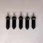 Five black obsidian point pendants showing natural crystal variation