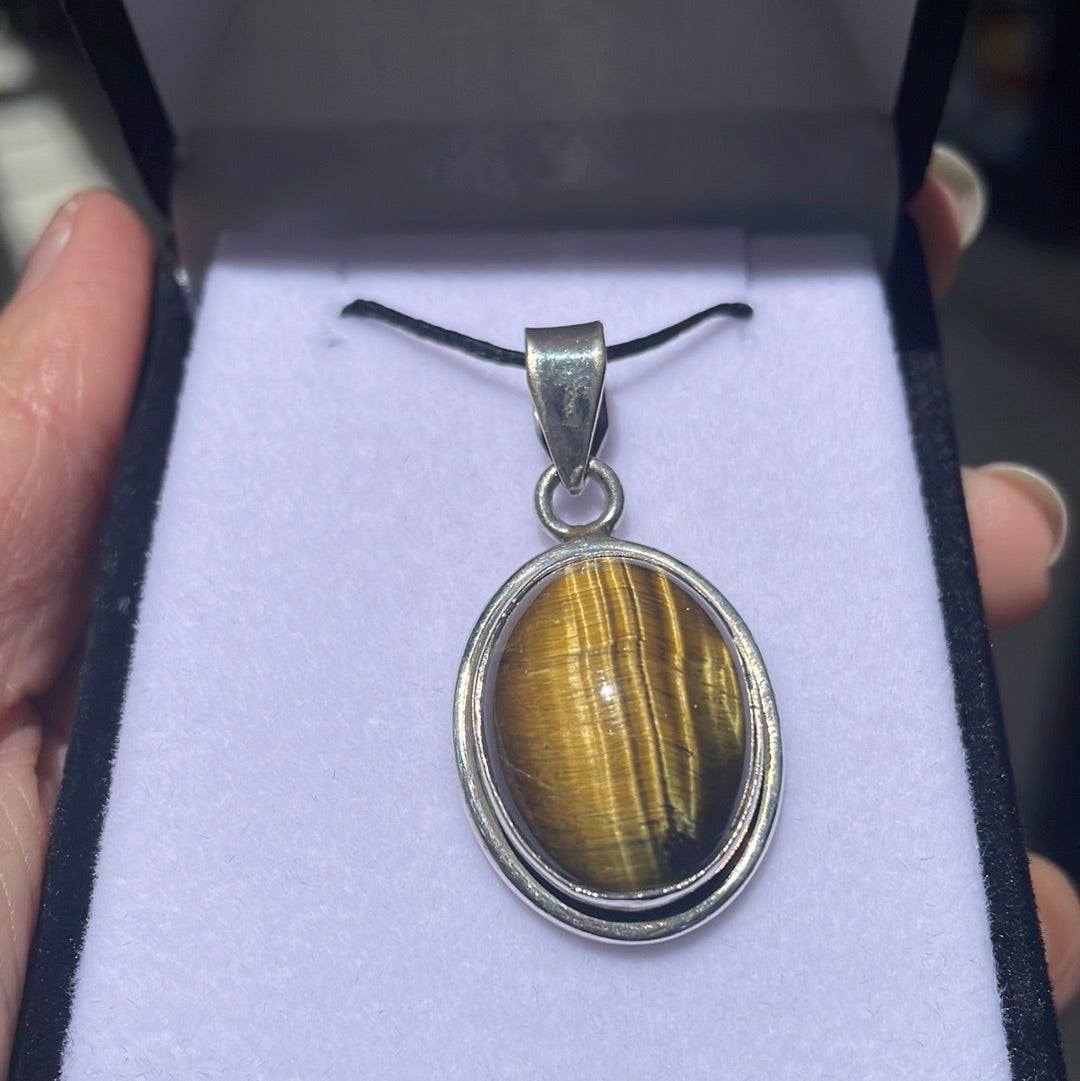 Tiger’s eye sterling silver oval pendant - Rivendell Shop