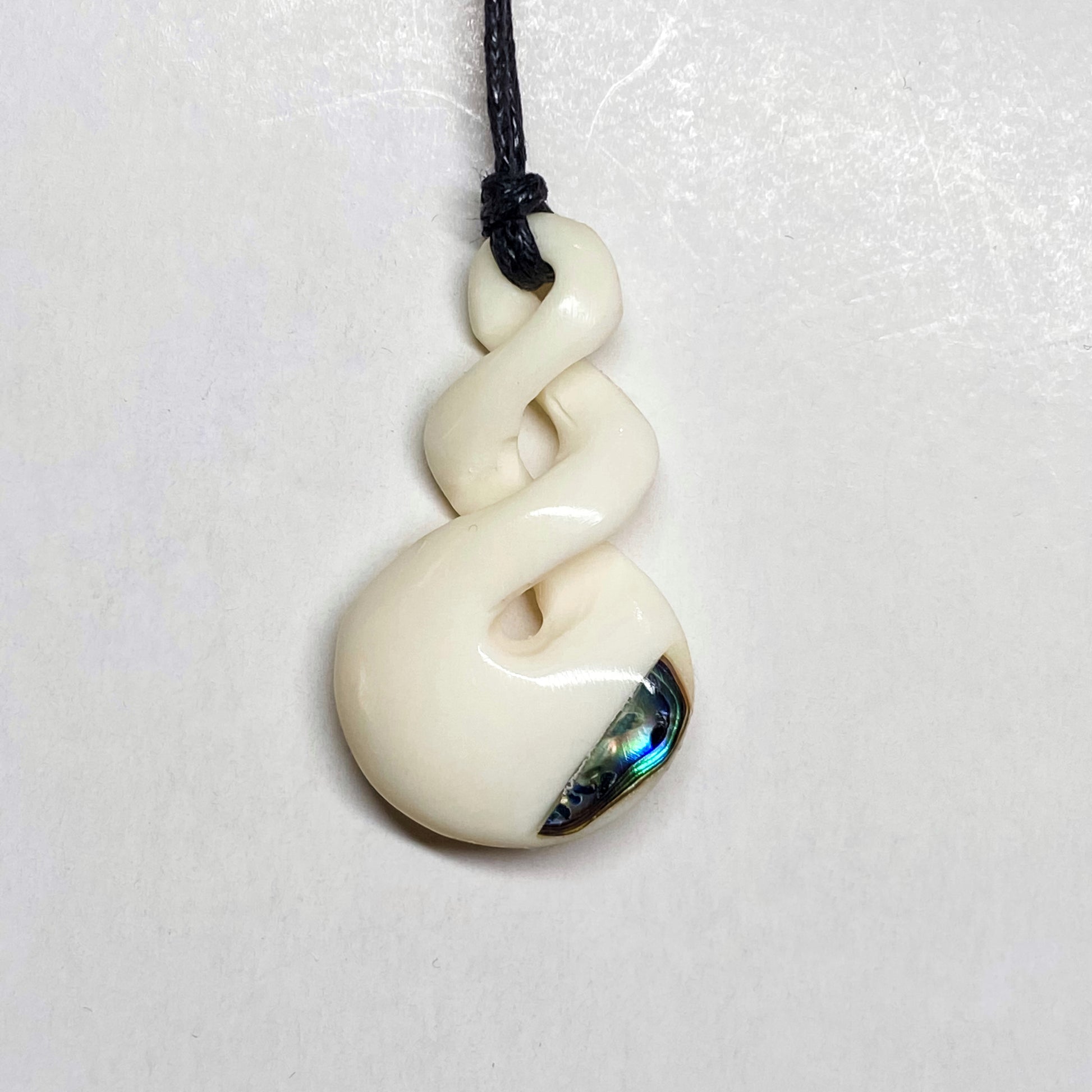 Handcarved Double Twist Bone Carving Pendant With Paua - Pikorua - Rivendell Shop