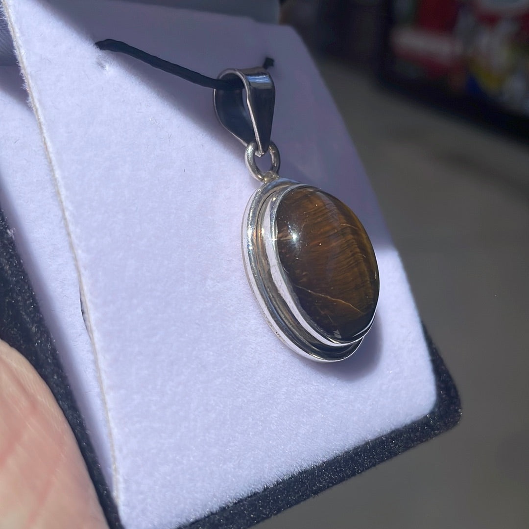 Tiger’s eye sterling silver oval pendant - Rivendell Shop