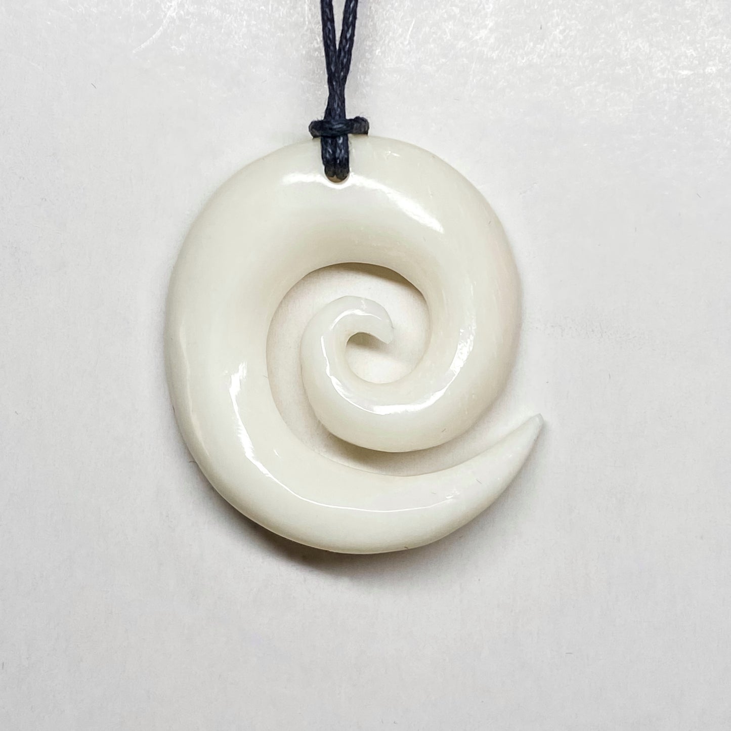 Handcarved Bone Koru Pendant - Rivendell Shop