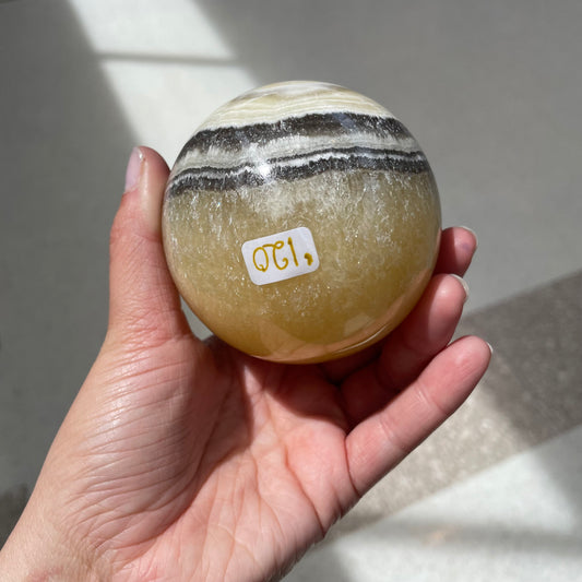 Zebra calcite sphere - Rivendell Shop