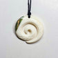 Handcarved Bone Koru Pendant With Paua - Rivendell Shop